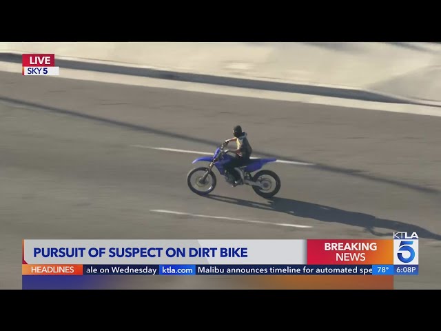 LAPD officers chase suspect fleeing on dirt bike