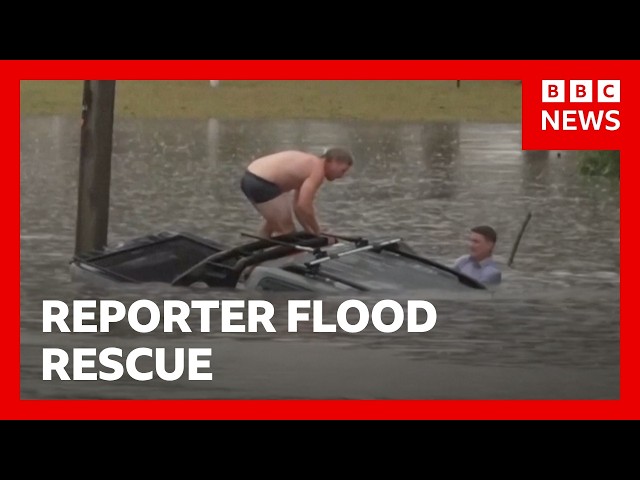 Reporter swims through flood to rescue man from sinking car | BBC News