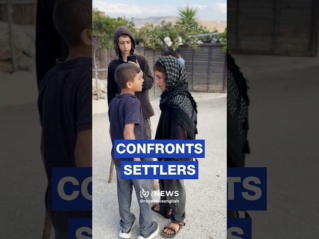 Palestinian child confront 'Israeli' settlers in West Bank
