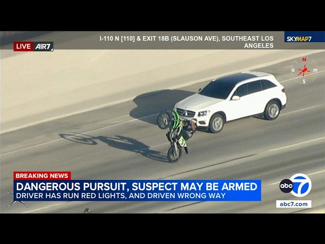 Wild LA chase: Biker does wheelie alongside fleeing Mercedes-Benz