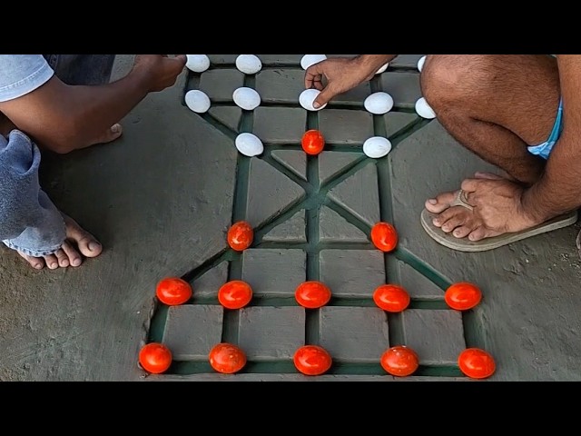 Village Men Enjoying a Traditional Strategy Game  #VillageLife #BoardGame #RuralCulture  #LocalGame 