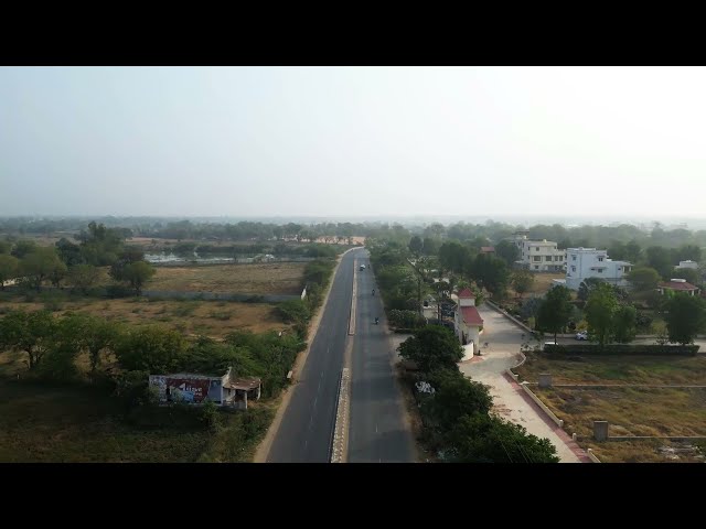 4K Drone Footage of Lush Green Agricultural Fields with Highway Aerial View - Silent Epoch