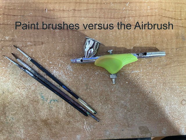 Paint brushes versus the airbrush