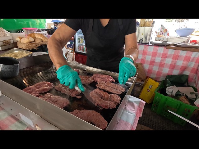 Italian Grill, Soft Salamelle Sausages, Skewers, Hams. Italy Street Food Fair. Turin, Torino
