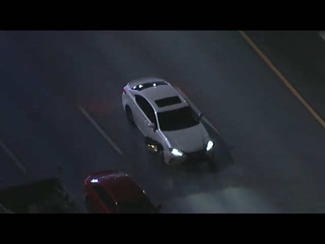 CHASE: Assault suspect on shredded tire leads police on slow-speed chase