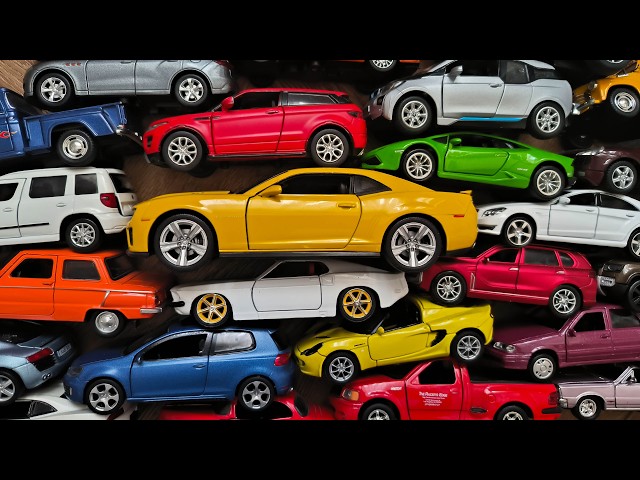 Hypertrophied Toy Car Among Ordinary Toy Cars Collection in 4k Video