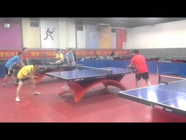 An amateur table tennis game in a club in China