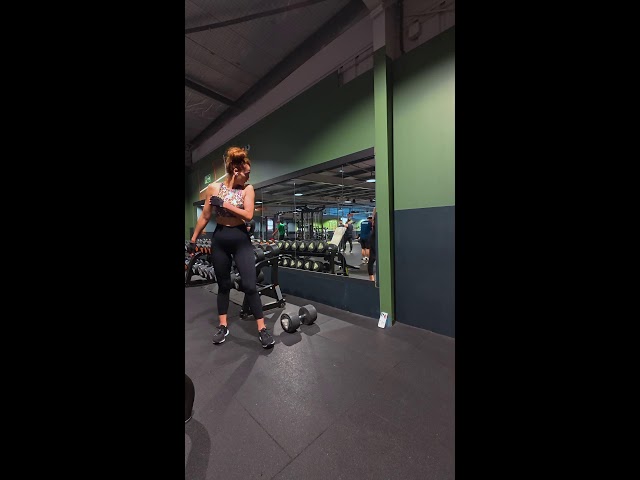 Sport Basic fit. Beautiful girl training legs