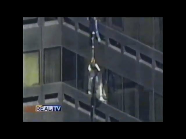 Window Washers Dangle From Twentieth Floor Of Skyscraper