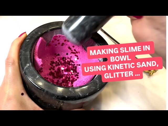 Making slime from kinetic sand, glue, activator and shaving cream.