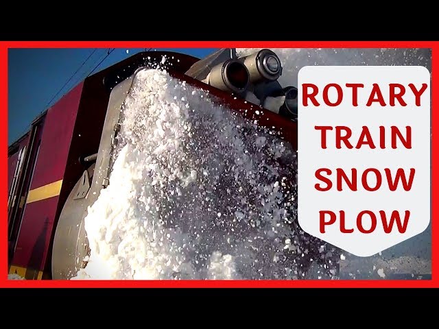 Train snowblower plows the railways after snow storm  - Train Snow Plow - Rotary Snow Plow Blower