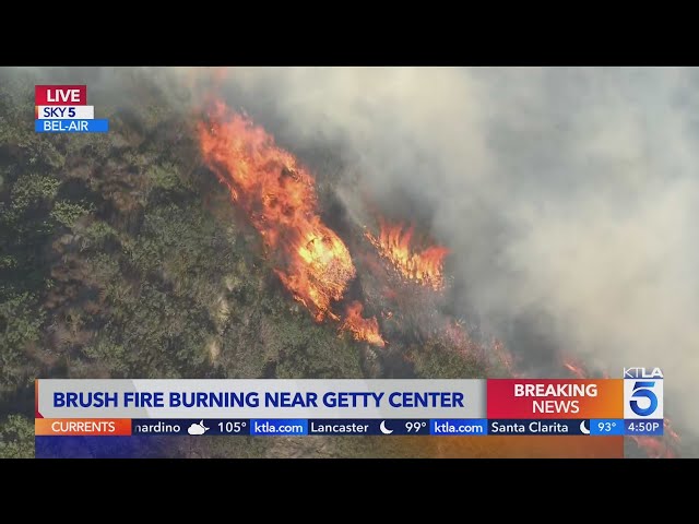 Brush fire burning near Getty Center prompts evacuation warnings