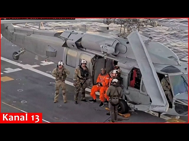 Artemis II astronauts emerge from their moon capsule after returning to Earth
