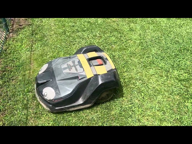 Stock Footage, Robotic Lawnmower. Public Domain, Use How You Like, Royalty-Free