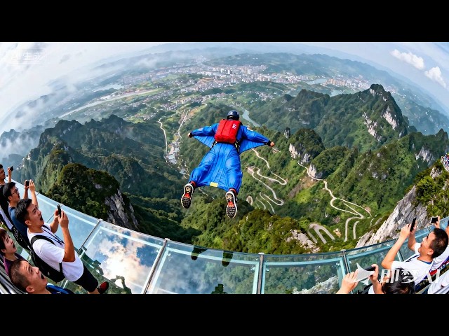 Passing by the 1000-meter-high mountainside and climbers #Wing mounted Pilot Zhang Shupeng
