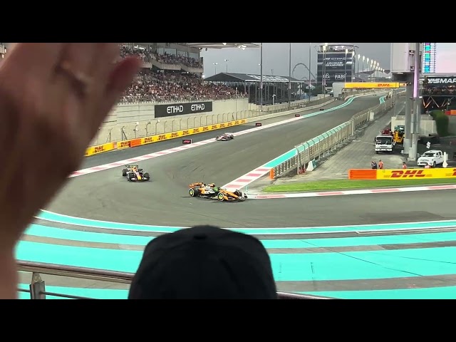Formula 1 - Lando Norris overtakes Yuki Tsunoda - Abu Dhabi 2025 - West grandstand