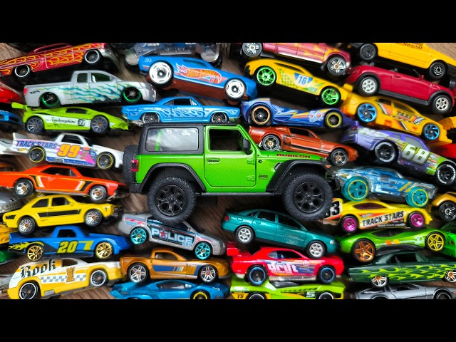 Green SUV is Bigger Than Small Toy Cars Around it