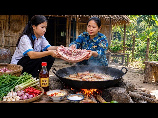 A single mother fries pork to sell, earning money to support her child's education