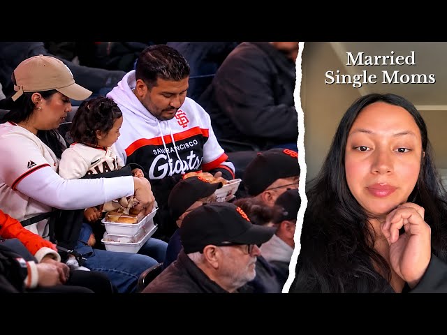 "Multitasking Mom" Goes Viral At Baseball Game While Husband Sits By Doing Nothing 