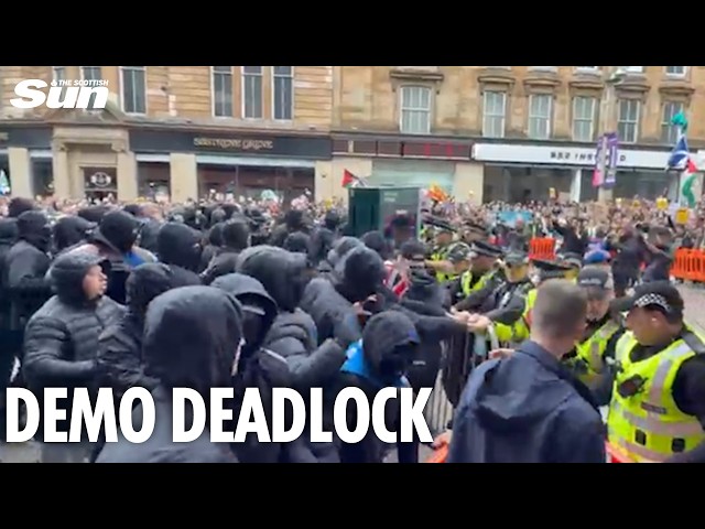 Hundreds of pro refugee & anti immigration protesters locked in intense stand off in Glasgow