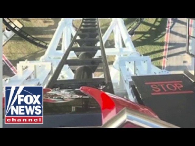 Riders left DANGLING after roller coaster STALLS