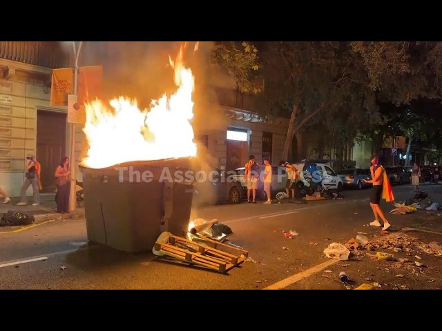 Clashes between far-left protesters and police after nightfall in Barcelona on region’s national day