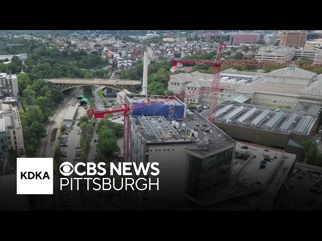 2 men arrested after parachuting from Pittsburgh building, landing in parking lot in front of guard