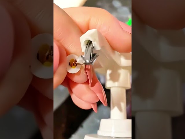 white plastic clamp held with careful precision #clamp #diy
