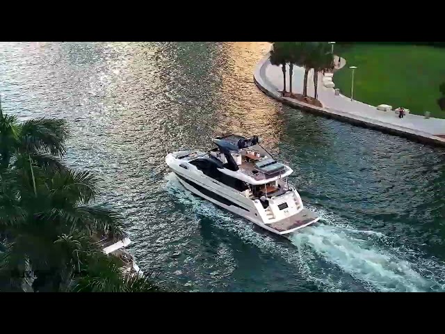 MIAMI VICE motor yacht heads upriver past the Brickell Bridge (Oct 21, 2026)