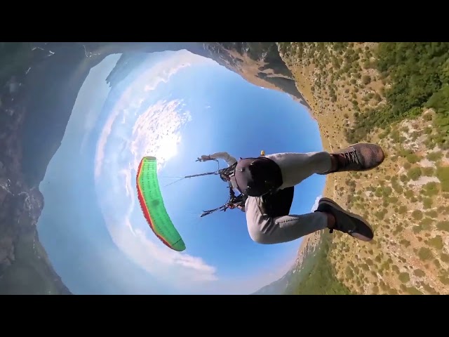 The oldest paragliding acrobatic pilot practice in the strong thermals, and land at the take off