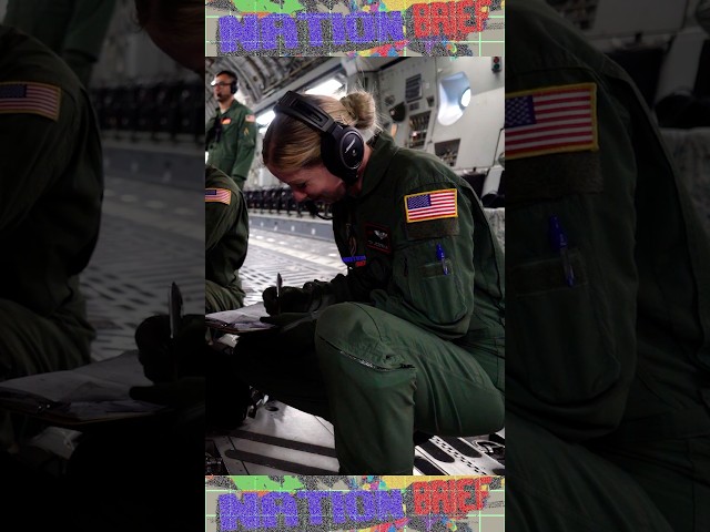 U.S. Air Force crew conduct pre-flight checks on a C-17 Globemaster