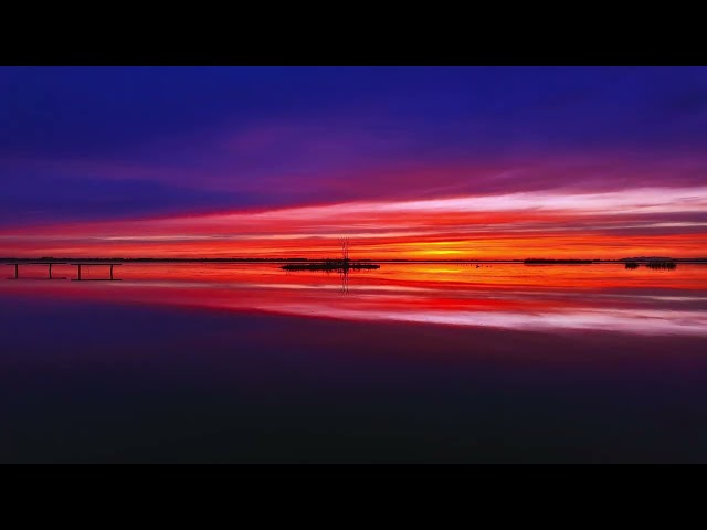 Double Sunset on Massaciuccoli lake - UHD 4K, nature scenery, cinematic drone view, relaxing music
