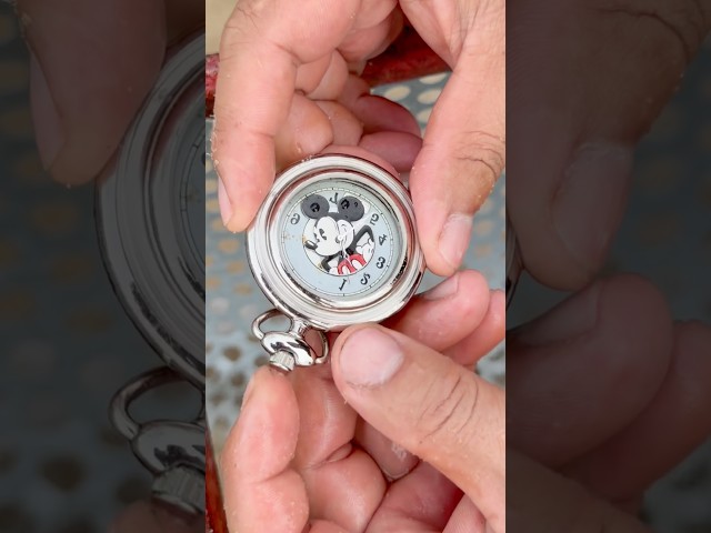 Finding a vintage Mickey Mouse pocket watch deep underwater! 🌊🐭