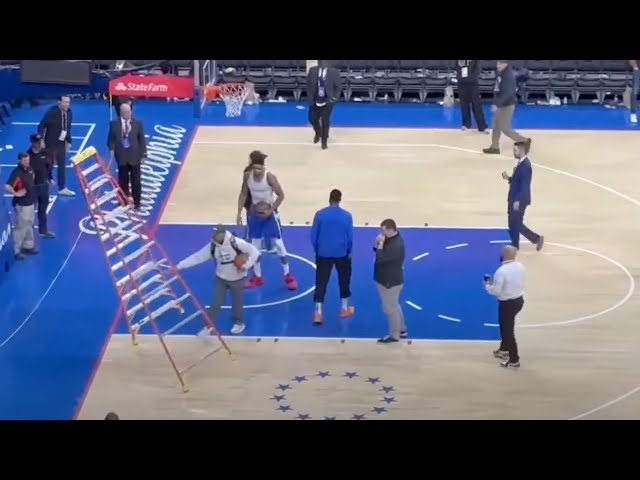 Giannis Antetokounmpo pushes ladder down after 76ers vs. Bucks matchup (via @dem389/Twitter)