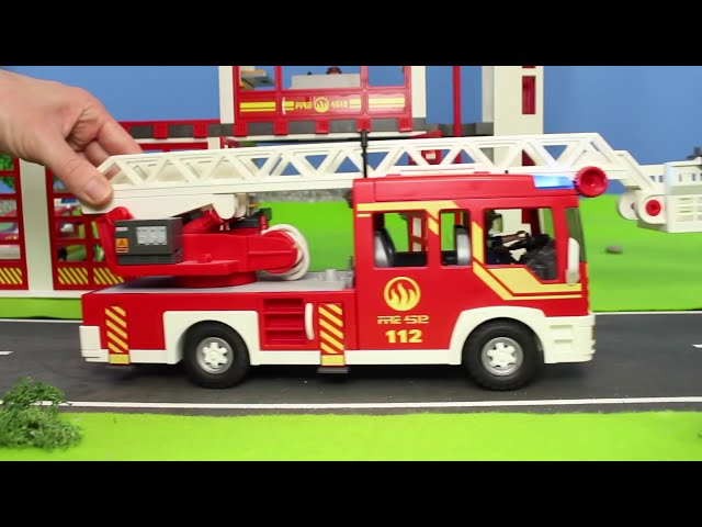 A Toy Fire Truck Extinguishes a Fire
