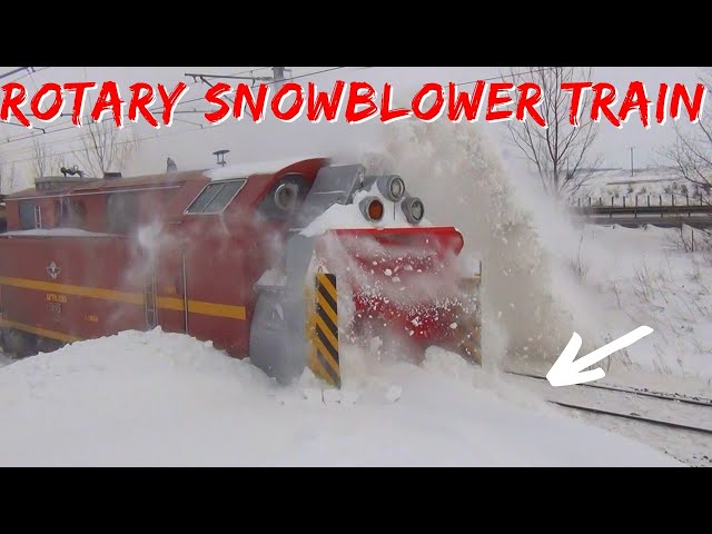 Busting Through HUGE Snow Banks in a Rotary Snow Train Plow - Train Snow Blower in Action